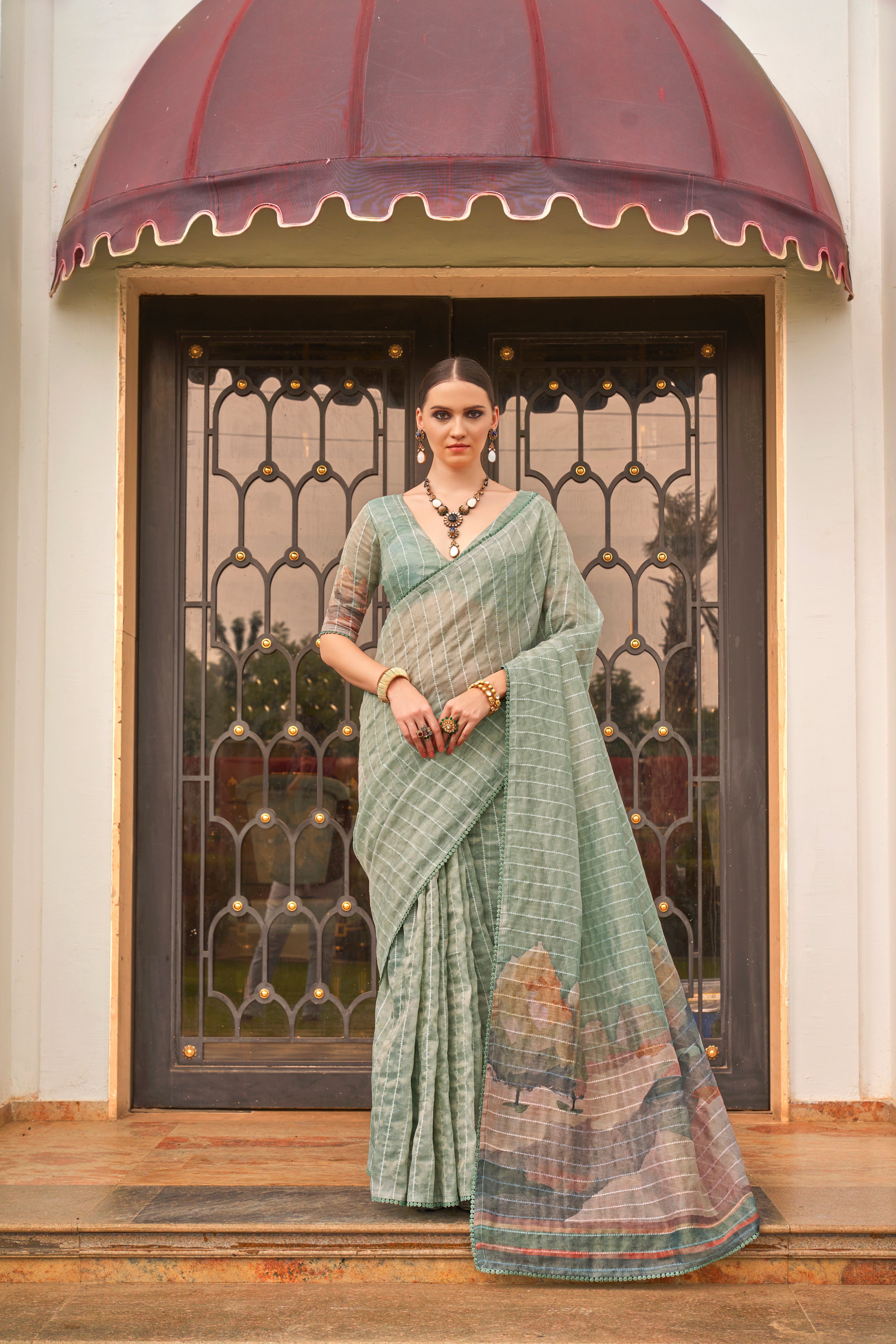 Green Pure Tissue Silk Saree