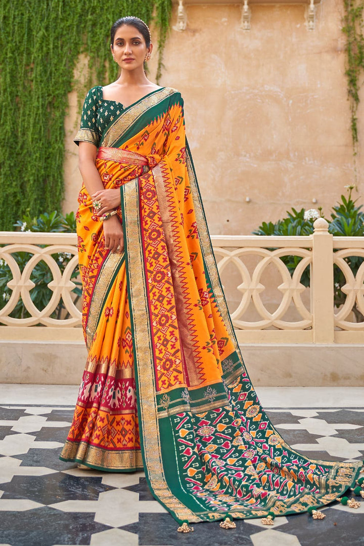 Buy Orange Patola Silk Sari Online in USA with Red Embroidered Border –  Pure Elegance